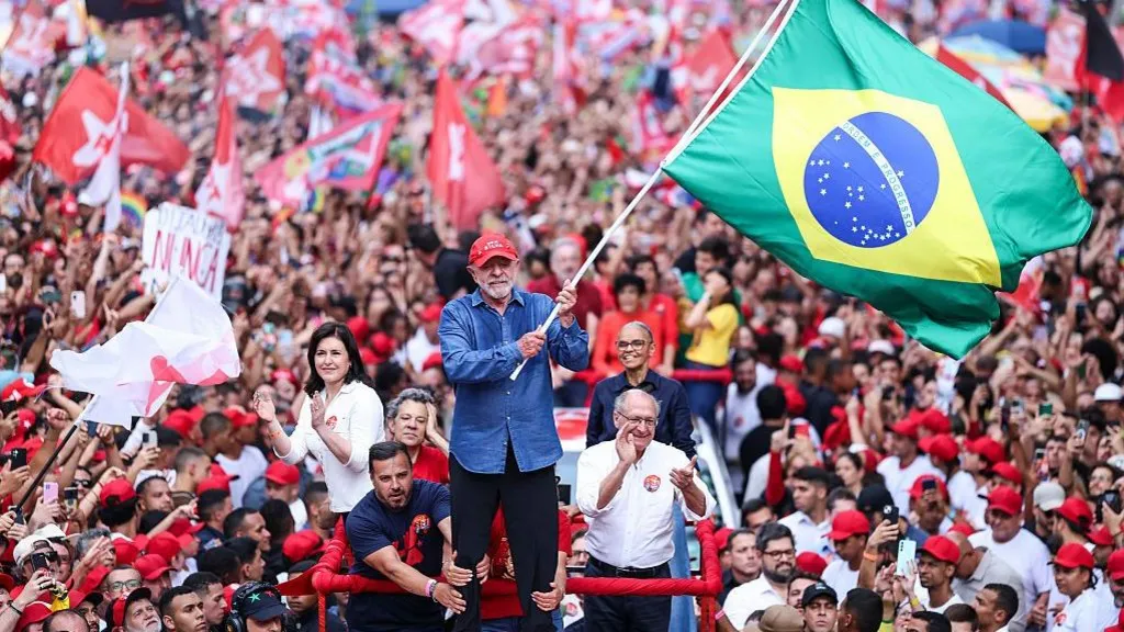 Getty Images Luiz Inácio Lula Da Silva, incumbent president of Brazil and presidential candidate for Partido dos Trabalhadores (PT) waves a Brazil flag during a rally ahead of the presidential runoff at Avenida Paulista on October 24, 2026 in Sao Paulo, Brazil.