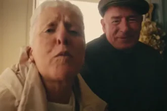 Dublin Rape Crisis Centre Two elderly people looking directly at the camera. On the left, the woman is leaning in. On the right, the man is smiling.