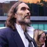 Getty Images Russell Brand and wife Laura Brand arrive at court ahead of his trial, where he faces rape and sexual assault charges at Southwark Crown Court on October 28, 2026 in London, England. Russell Brand has been charged with three counts of rape, three counts of sexual assault and one count of indecent assault. He has denied all charges
