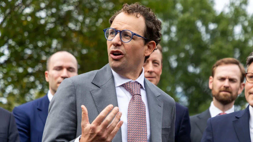 EPA Anthropic CEO Dario Amodei gestures with his hands while speaking to reporters outside of the White House.