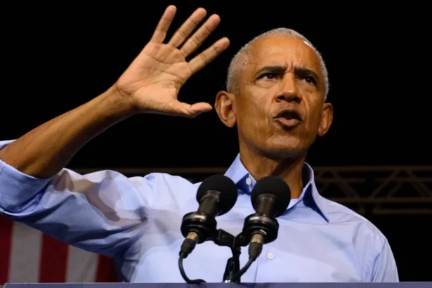 Getty Images Obama gestures as he speaks at a podium