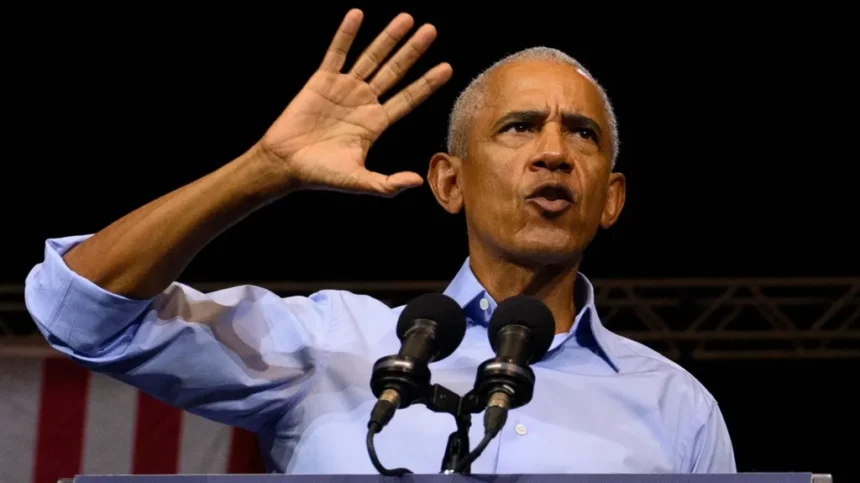 Getty Images Obama gestures as he speaks at a podium