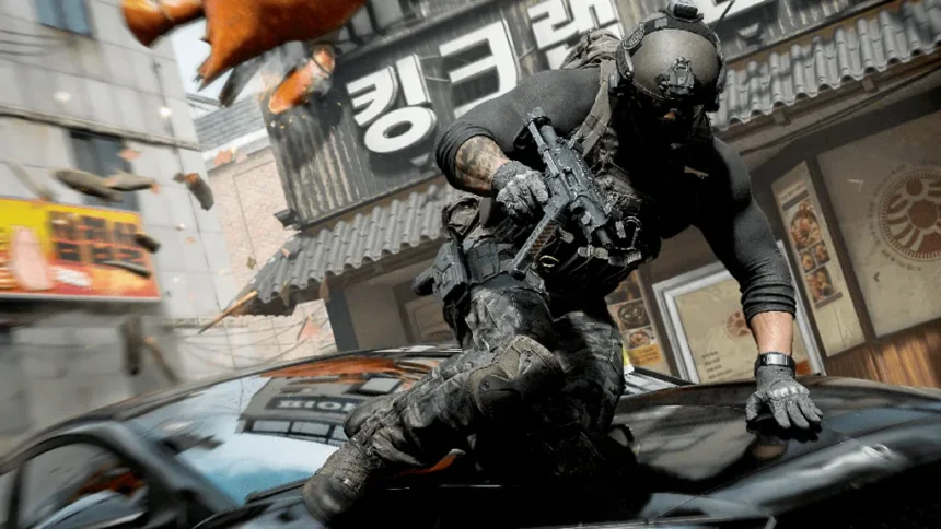 Activision A still from Call of Duty Modern Warfare 4 showing a soldier leaping over a car on a South Korean street. He wears a helmet and protective gear and is armed with a large gun.