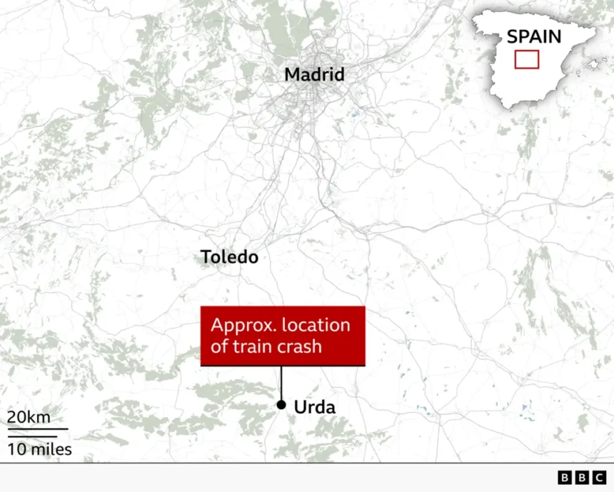 Map of central Spain showing Madrid and Toledo. A black dot and red label marks the "approximate location of train crash" near the town of Urda, south-east of Toledo. An inset map of Spain highlights the area in the centre of the country.