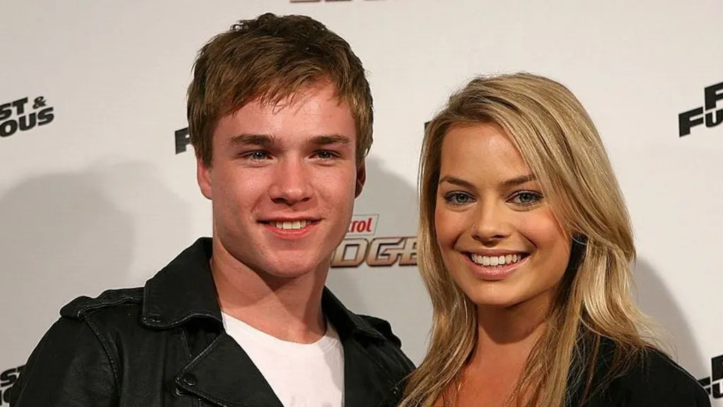 89368140-d349-11f1-8a05-59afc813496d-jpg Getty A young man with short brown hair and a woman with long blonde hair smile at the camera