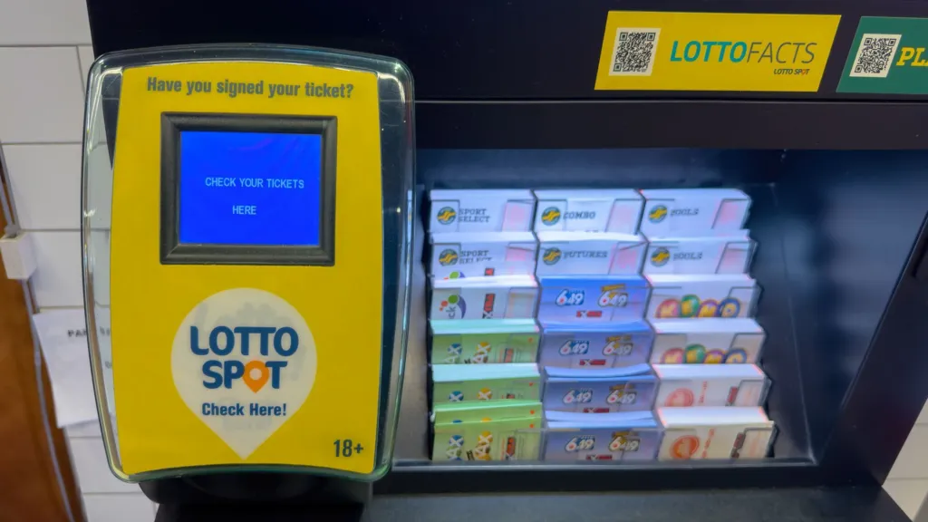Getty Images Lotto Spot ticket checker and lottery scratch card display in a retail store