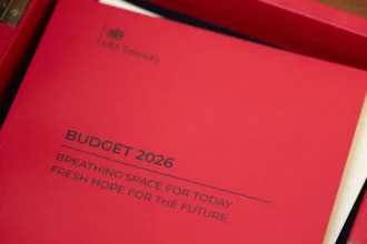 Kirsty O'Connor / HM Treasury The Budget 2026 cover, photographed in the No 11 office in Downing Street.