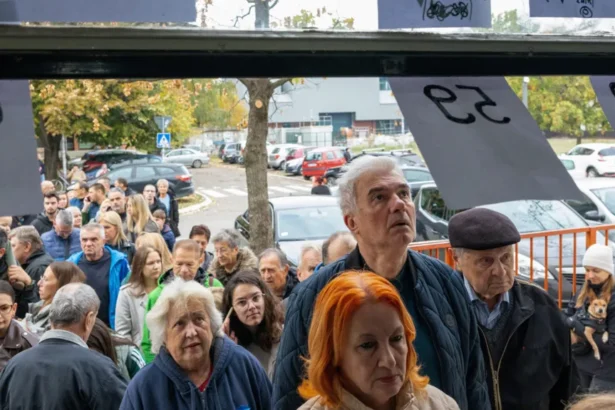Reuters People queue outside a polling station to vote during the parliamentary election in Novi Sad, Serbia,