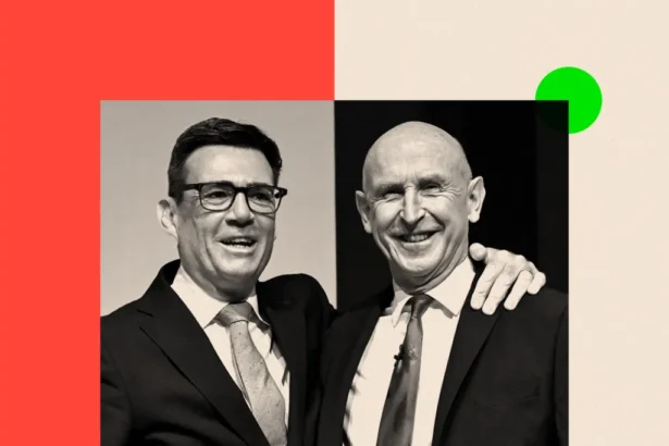 BBC A black and white photo of John Healey and Andy Burnham standing next to each other. Burnham has his hand on John Healey's shoulder
