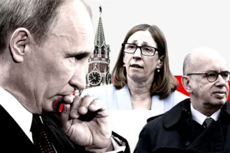 BBC/Getty Images Vladimir Putin, former US Ambassador to Russia Lynne Tracy, and former French Ambassador to Russia Pierre Levy in front of the Kremlin's Spasskaya Tower.