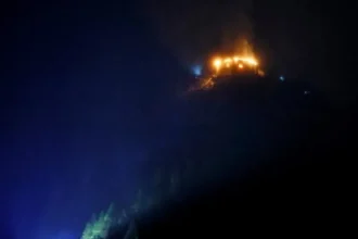 Reuters The Eagle's Nest on fire in the dark