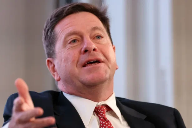 Reuters Jay Clayton gestures with his right hand