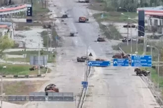 Reuters/Handout  A still image taken from an undated drone video released September 24, 2026, shows destroyed vehicles sitting on a street in Oleshky, Kherson Region, Russian-controlled Ukraine.